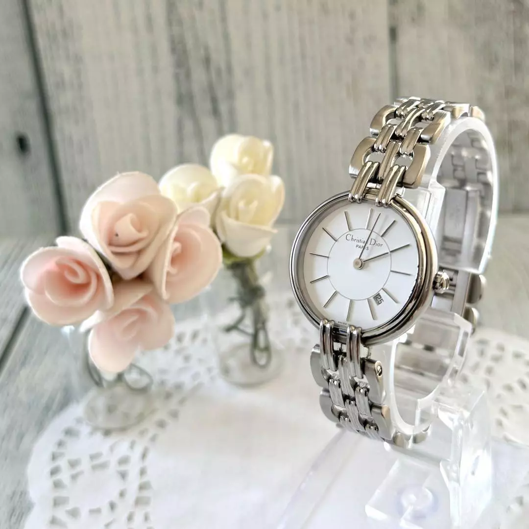 Montre Christian Dior blanche et argent fonctionne du Japon
