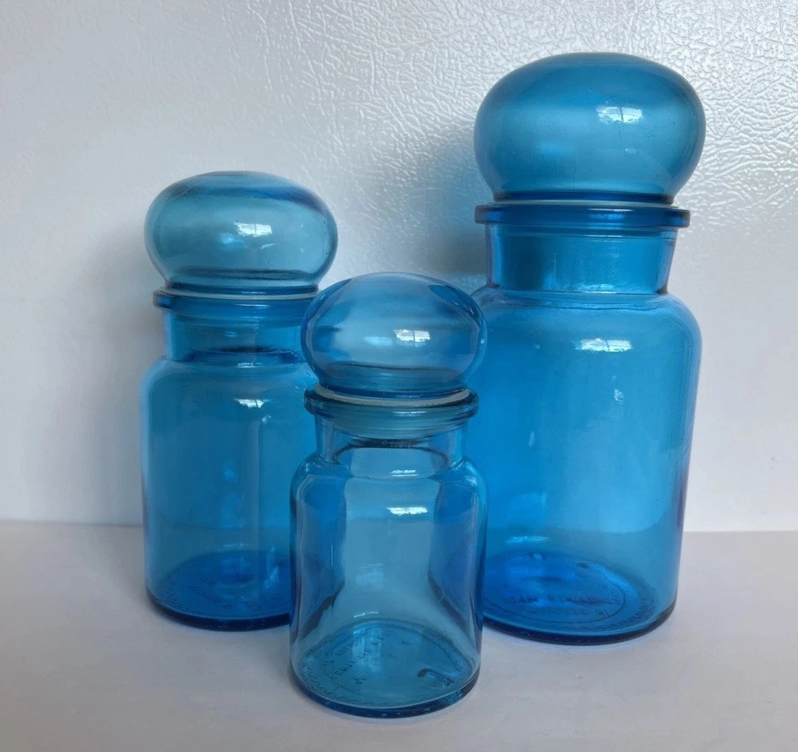 VINTAGE APOTHECARY JARS BELGIUM-Lot Of 3 w/bubble Lids Teal Glass 8.75”-7”-5.75”
