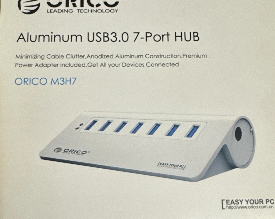 Concentrador USB 3.0 de 7 puertos alimentado por aluminio ORICO con adaptador de 3 puertos de carga rápida USB Foto 2 de 3