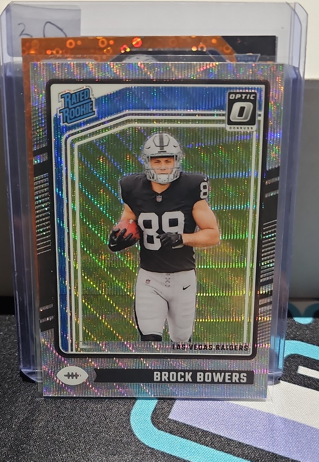 2024 Panini Donruss Optic - Rated Rookie Brock Bowers #215 Wave Prizm /300 (RC)