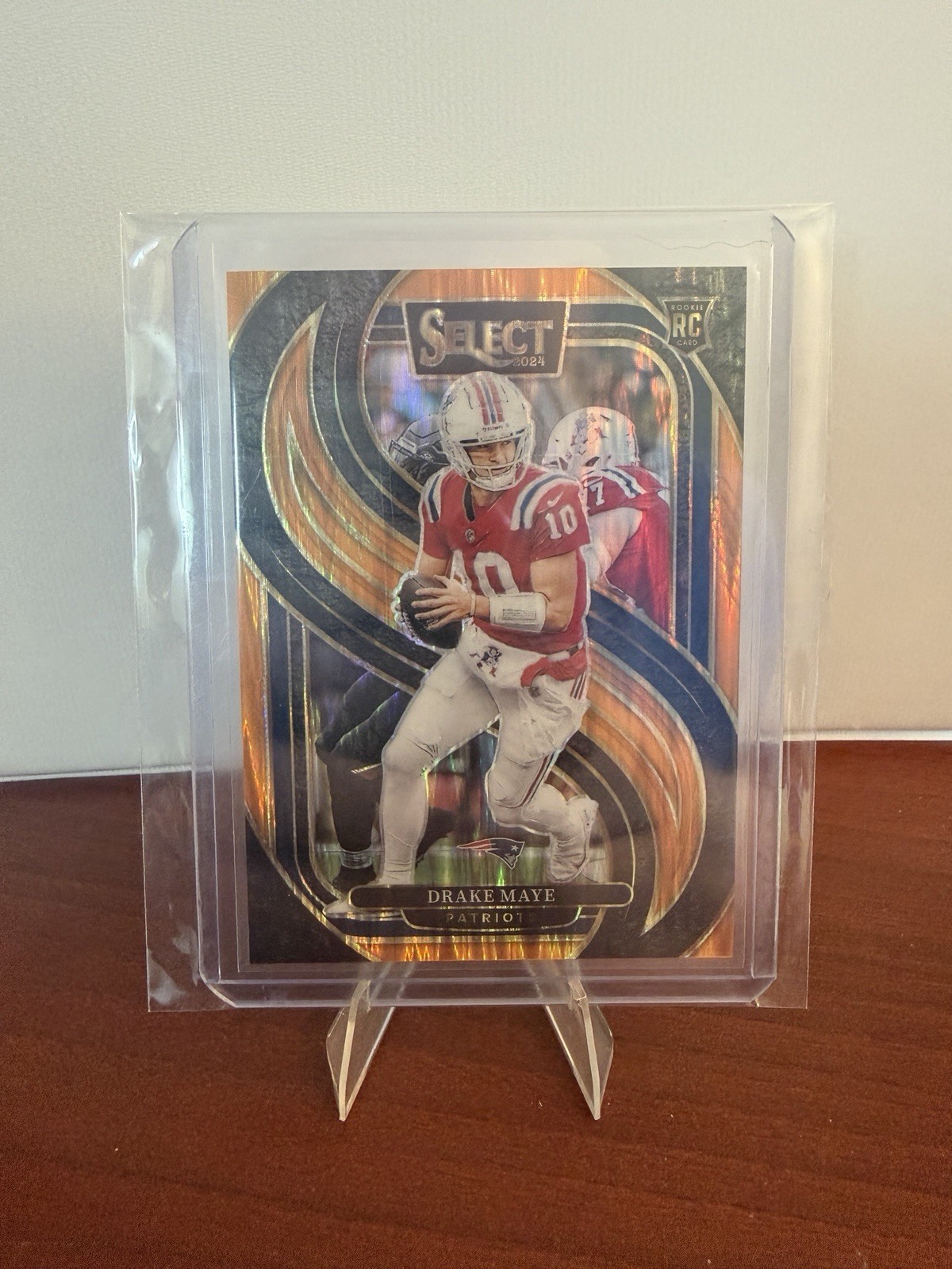 2024 Panini Select - Premier Level Drake Maye #113 Orange Shock Prizm /399 (RC)