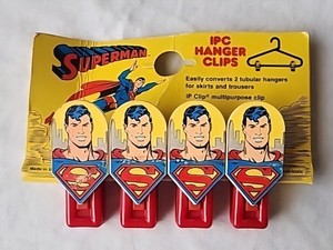 Superman Hanger Clips Set Of 4  New But Shelf Worn. Vintage 1987