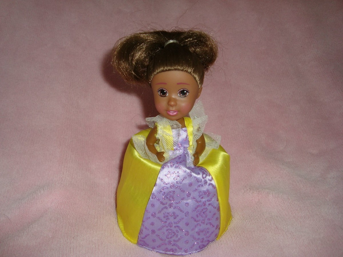 Haschel Toys Cupcake Surprise Doll Brown hair yellow Purple