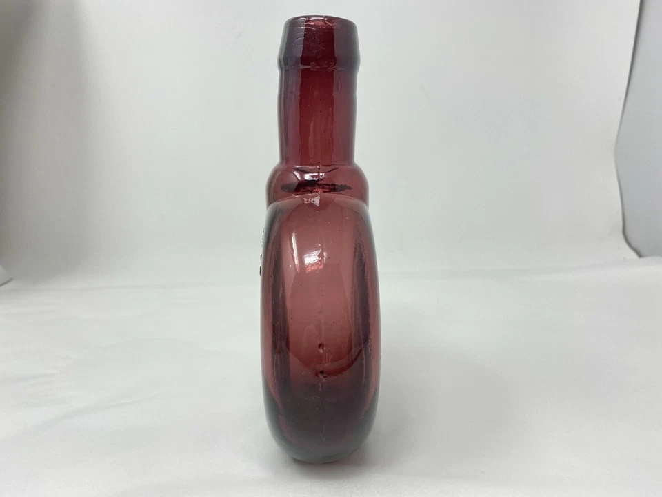 Botella de vidrio púrpura vintage Clevenger Brothers High Wheeler Boneshaker bicicleta Foto 3 de 4