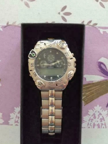 MONTRE ERIC CHEVILLARD STAINLESSE STEEL BACK N 232371 WATER