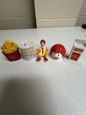 collection of vintage items includes iconic McDonald's Happy Meal toys