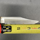 Remington Grizzly DBL Lockback Knife with Blade Saw Hook Rubber Grip Black — photo 3