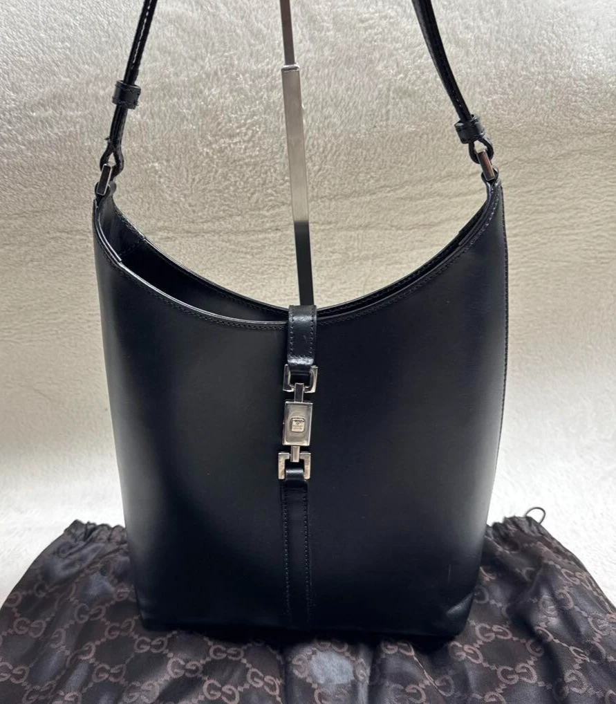 Sac bandoulière hobo cuir noir GUCCI Jackie fabriqué en Italie occasion avec sac de rangement