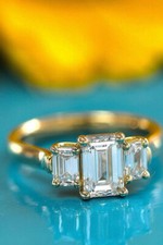 3Ct Emerald Cut Simulated Diamond Classic Three Stone Ring Yellow Gold Plated