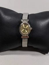 Claremont Gold Tone Dial Oval Silver Tone Dial SS Stretch Band Watch 