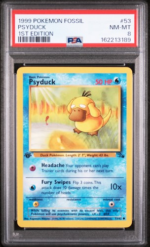 1999 POKEMON FOSSIL 1ST EDITION #53 PSYDUCK PSA 8