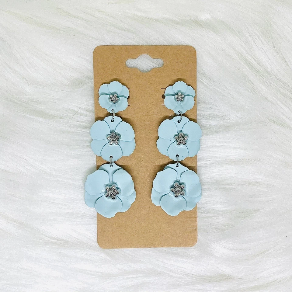 Pendientes de cerámica con flores azules Foto 2 de 4