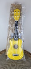 Kids Toy Guitar Ukulele Yellow 17" Plastic New Whit Minor Cosmetic Flaw