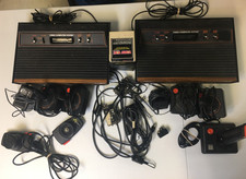2 Atari 2600 Consoles Lots of Extras For Parts or Repair As Is Controllers Games