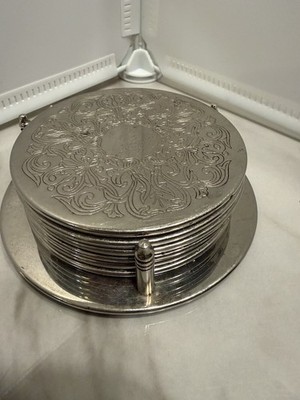 Coaster Set Embossed Silver-plate with Black Leather Vinyl Bottom  7 Pieces