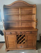 This is an American Drew Grand Isle Buffet with HutchCrafted of maple and burl