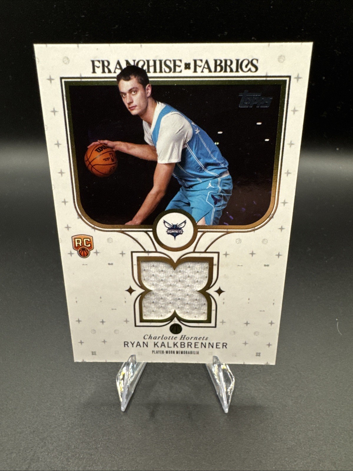 2025-26 Topps - Franchise Fabrics Ryan Kalkbrenner #FF-RK (MEM, RC)