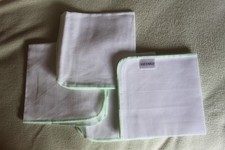 4 Liz Earle muslin facecloths. Only 0ne has the Liz Earle label