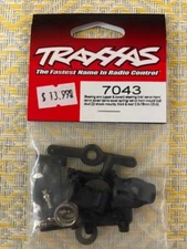 Traxxas Part #7043: Steering Arms/Link, Servo Saver/Horn/Spring, Shock Mounts;