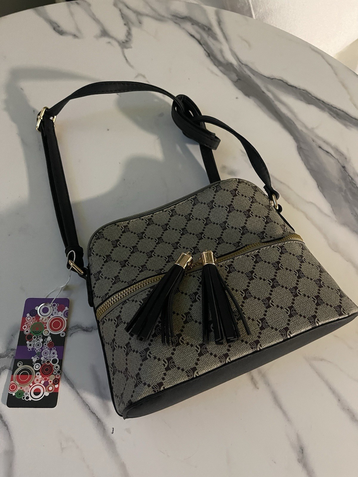 Cartera Bandolera Bumble Bee Cúpula Taupe con Borlas