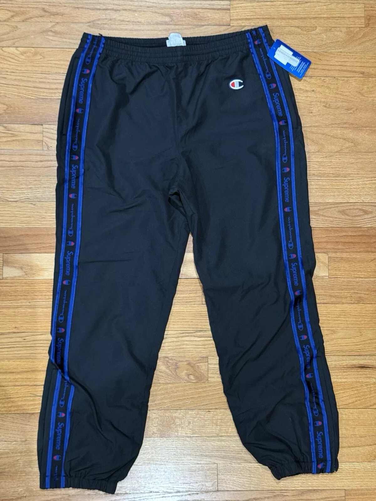 PANTALON D'ÉCHAUFFEMENT SUPREME FW14 CHAMPION TAILLE XL NOIR 
