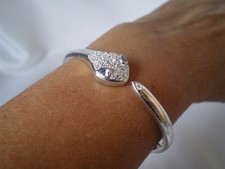 Tanzanite Oval hinged Bangle, 1.2 carats, in 20.41 grams of 925 Sterling Silver