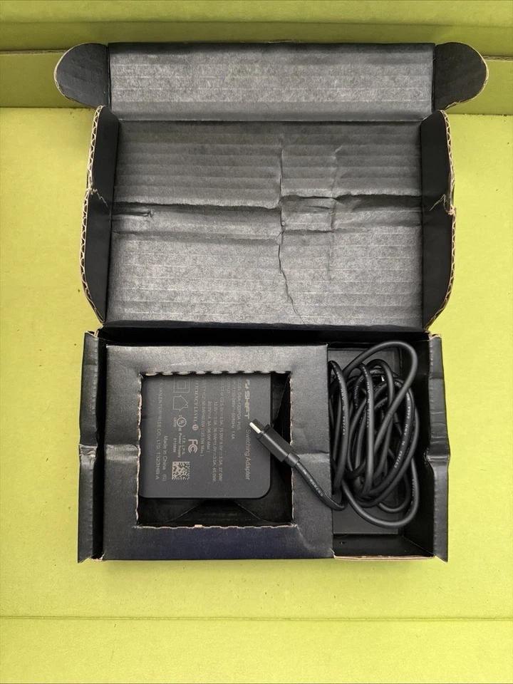 Dispositivo de movilidad Shift Robotics Moonwalkers AI con cargador y cables negro verde Foto 4 de 4