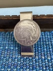 Liberty 1922 Peace Silver Dollar mounted on a silver advertisement money clip