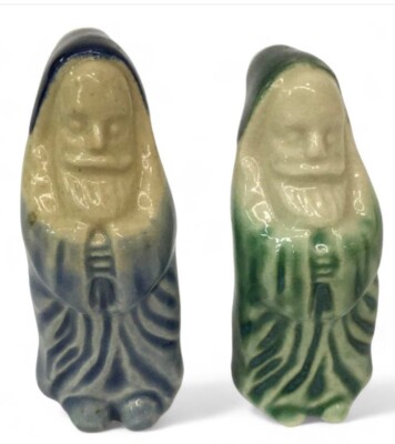 Pair Of Asian Mud Figures