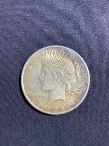 1922-D Silver Peace Dollar Toned/Burnished Circulated In Coin Sleeve