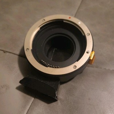 Lens Adapter with Electronic Contacts and Tripod Mounting Plate for Cameras