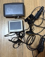 Two Models of TomTom GPS Navigation Devices and Their Accessories. Used