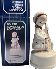 Vintage bisque girl playing cello W/ Bunny music box 1983 tune “feelings” W/BOX