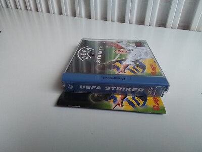 Jeu Vintage Sega Dreamcast U E F A STRIKER complet avec son manuel Jeu Vintage Sega Dreamcast U E F A STRIKER complet avec son manuel
