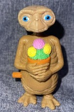 ET Universal Studios Extra Terrestrial Wind-Up Toy Holding Flowers 3.5 Works
