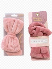 Set of 2 plush pink spa headbands.