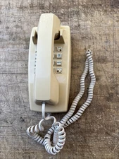 AT&T Electric Ivory touch tone wall phone. Not Tested. Selling As Is