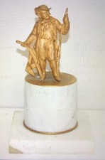 ORIGINAL An antique gilt metal figure farmer and plough on marble base