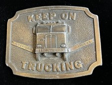VINTAGE 1975 BRASS BERGAMOT KEEP ON TRUCKING BELT BUCKLE MADE IS USA