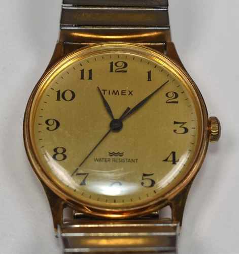 Vintage Timex Water Resistant Quartz Gold Tone Wrist Watch w Stretch Band