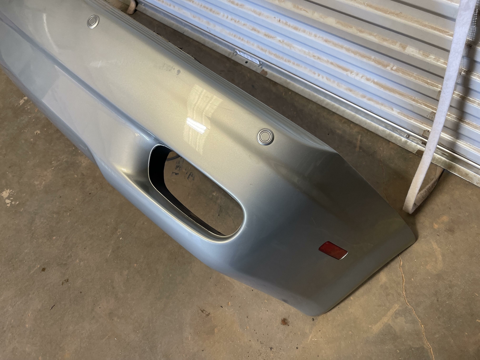 2005-2008 MASERATI QUATTROPORTE REAR BUMPER COVER W/ SENSORS SILVER OEM