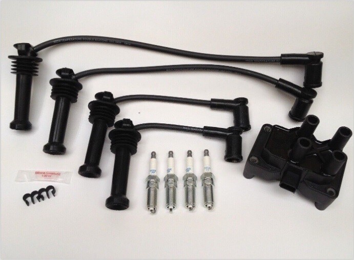 FORD FIESTA MK6 IGNITION COIL PACK HT PLUG LEADS SET NGK SPARK PLUGS 1.