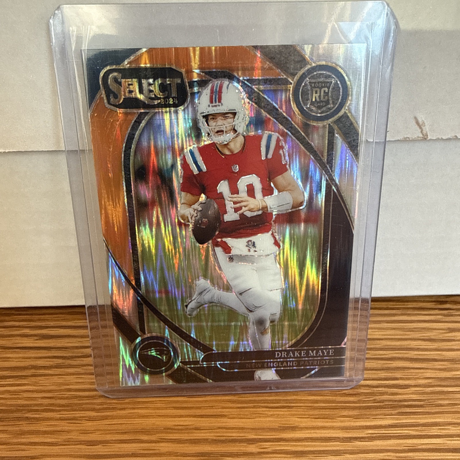 2024 Panini Select - Club Level Drake Maye #218 Black & Orange Shock Prizm (RC)