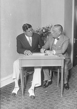 Colonel Jacob Ruppert is seen here sitting beside Babe Ruth as lat- Old Photo