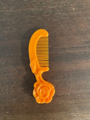Vintage Kenner Rose Petal Place orange plastic comb with free shipping