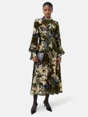 jigsaw green dress Woman Wearing A Large Green Gown In The Jigsaw Puzzle by Paper Boat Creative