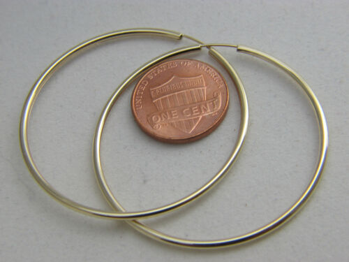 Orecchini a cerchio senza fine in oro 10 kt orecchini in oro massiccio 10 kt - Foto 5 di 5