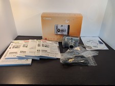 Canon PowerShot A560 7.1MP 4x Digital Camera - Silver W/Box And Accessories