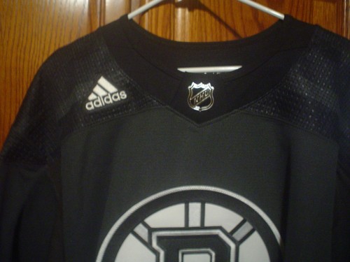 BOSTON BRUINS MIC CAMO JERSEY SIZE 60 WITH FIGHT STRAP 9 INCH EMBROIDERED LOGO