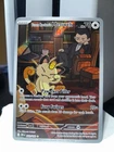 Team Rocket's Meowth 203/182 Sv10: Destined Rivals Holo